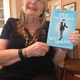 Grandma Ruth Ann Penzey with Dick Van Dyke’s book
